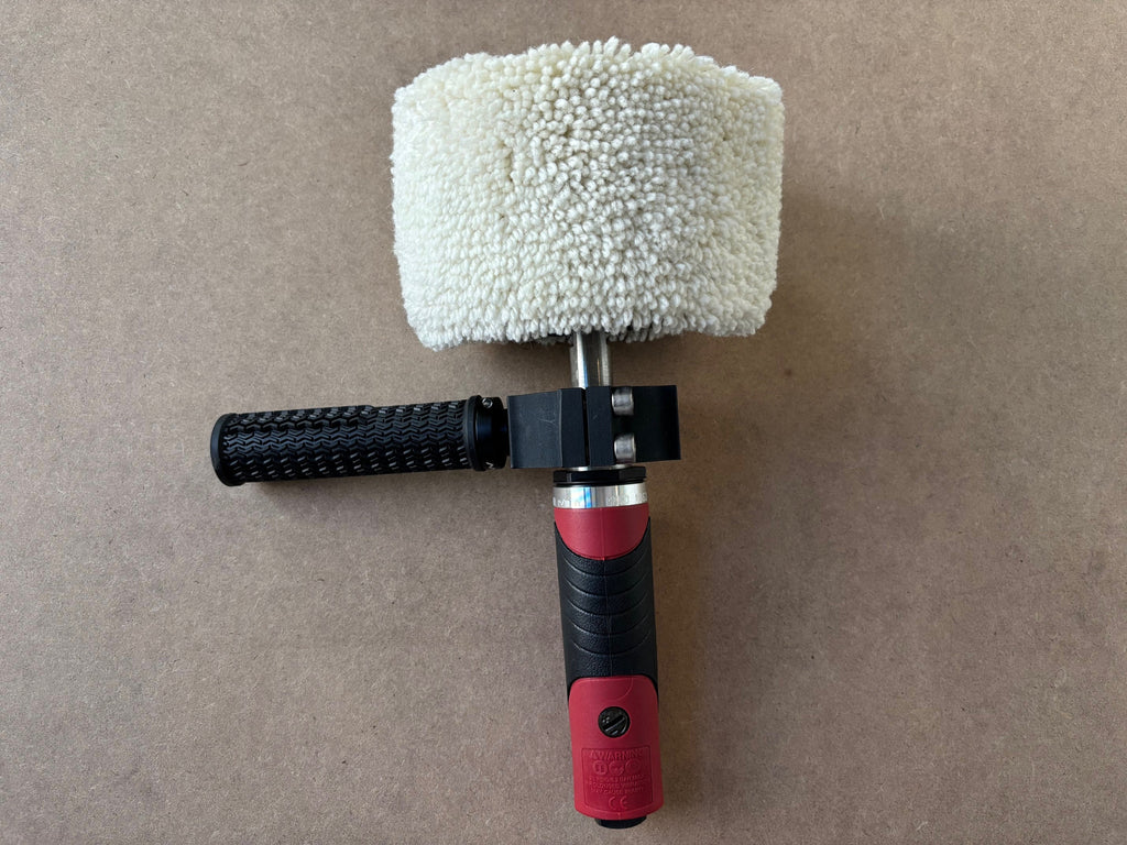 Lucid Aero Compact Drum Buffer front view with wool sleeve installed and Lucid Aero logo on mounting clamp