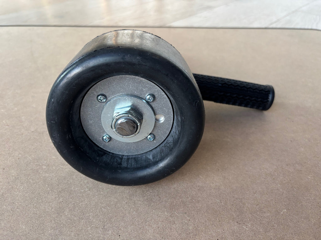 Lucid Aero drum buffer bare drum front-face view showing three-bolt hub pattern and black rubber drum body